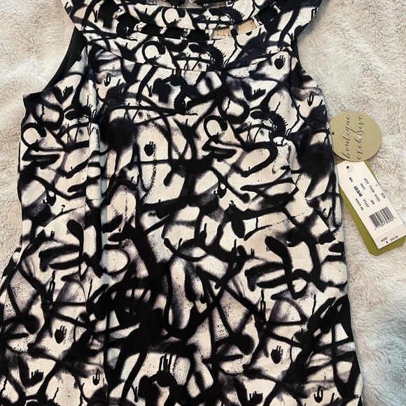 New! Nicole Miller Artelier black and white, lined cutout dress
NWT! Size 2 - Picture 5 of 11